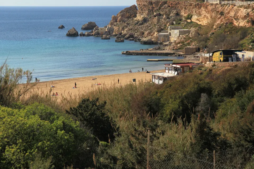 Golden Bay's sandy beach and cliffs seen from the hillside