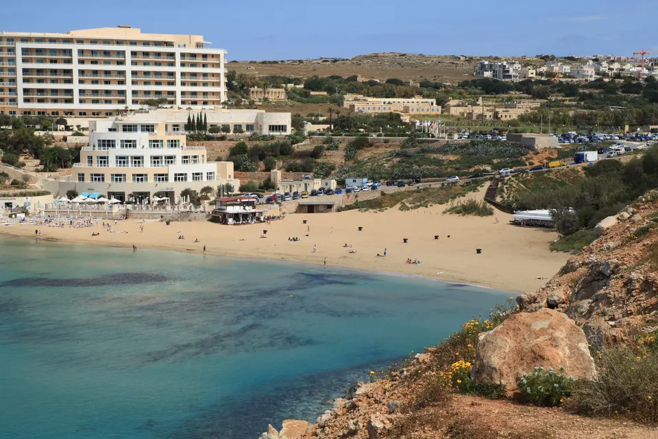 The wide sandy beach at Golden Bay in summer