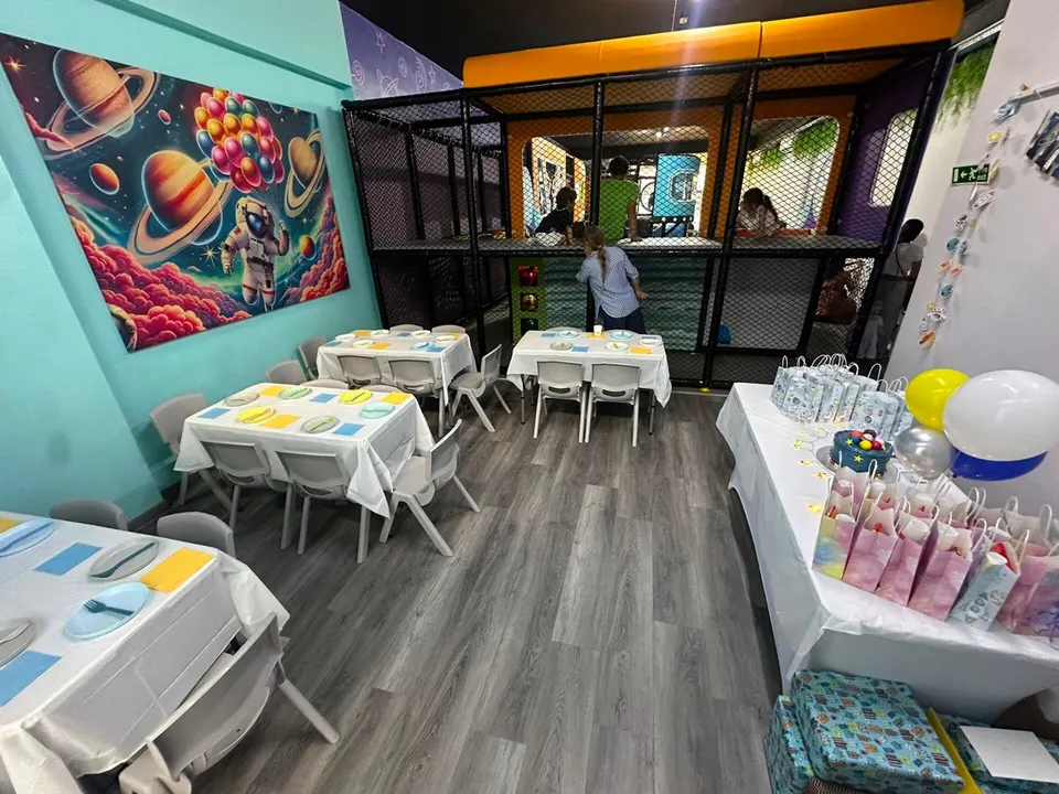 The party room with a space mural at Playland Malta