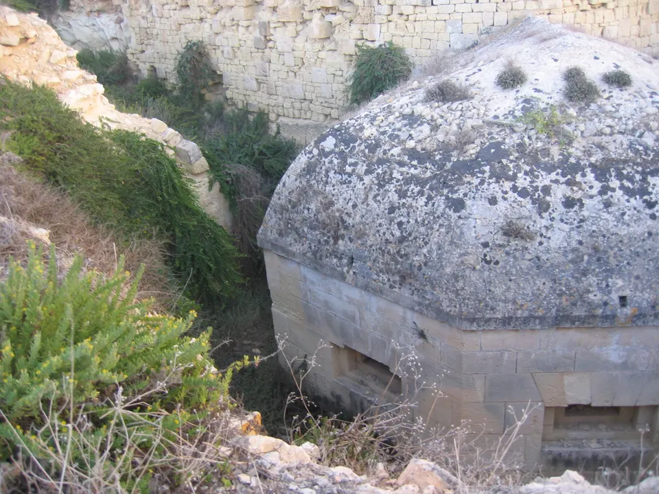 A domed stone caponier in the ditch of Delle Grazie Battery